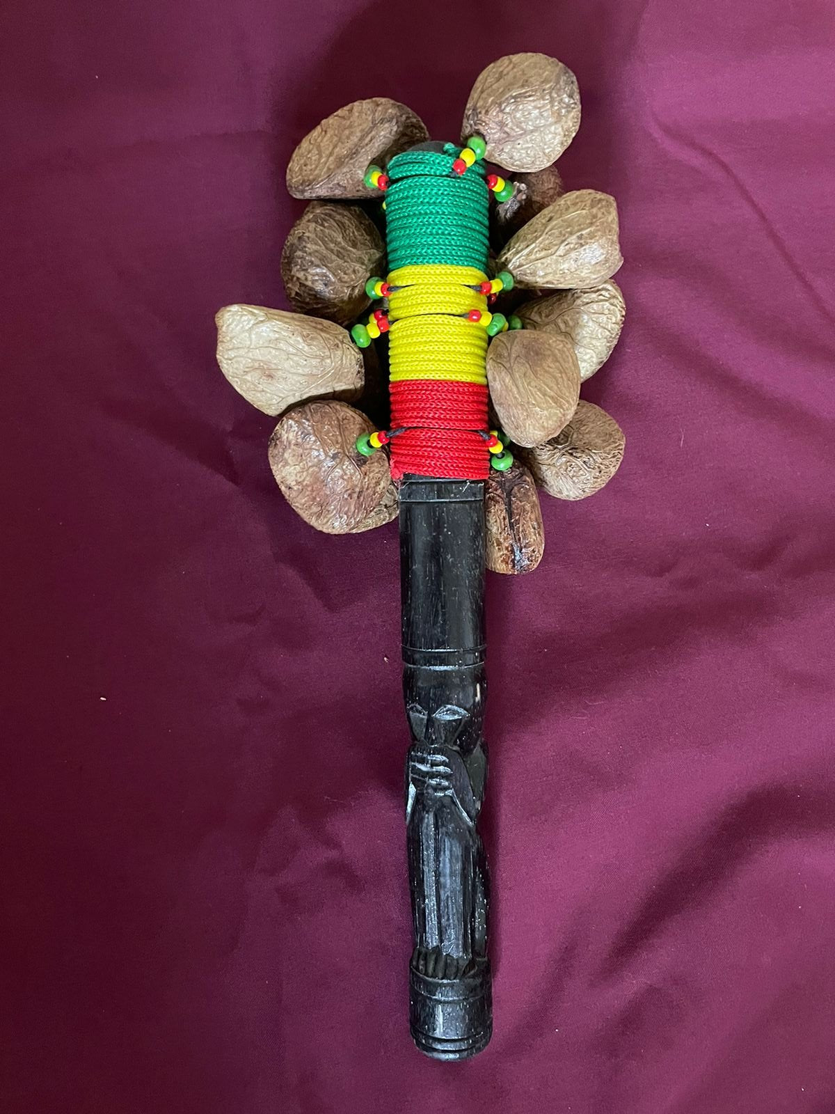 Nutshell rattle stick maracas