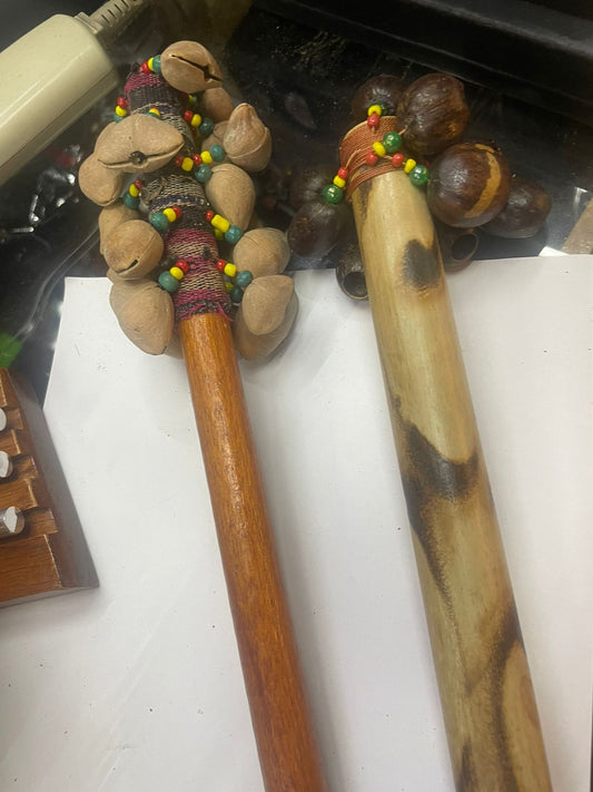 Nutshell rattle stick maracas